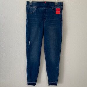 SPANX | Distressed skinny jeans in medium wash